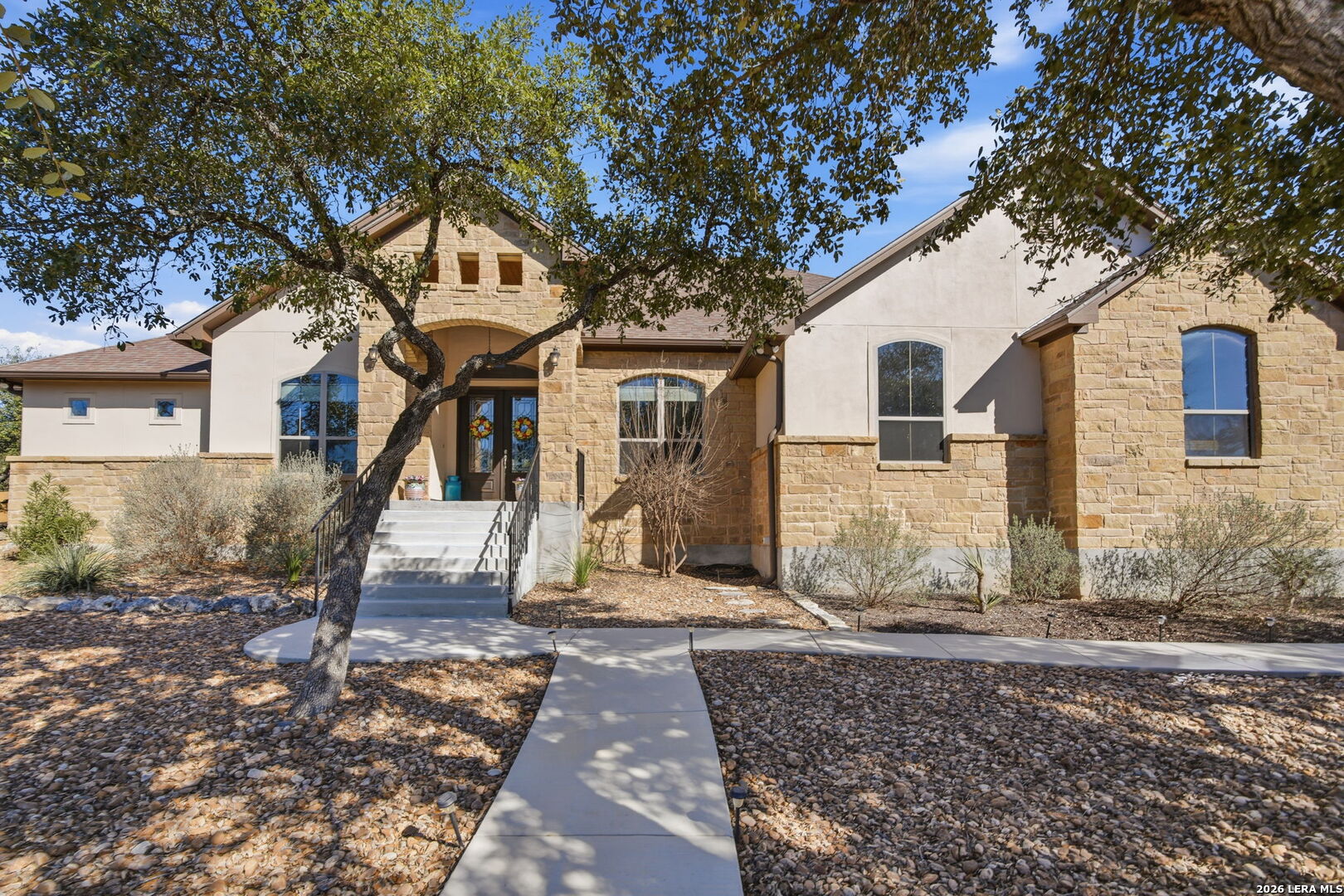 457 Havasu Point Spring Branch, TX 78070 - Photo 4 of 55 a front view of a house with a tree