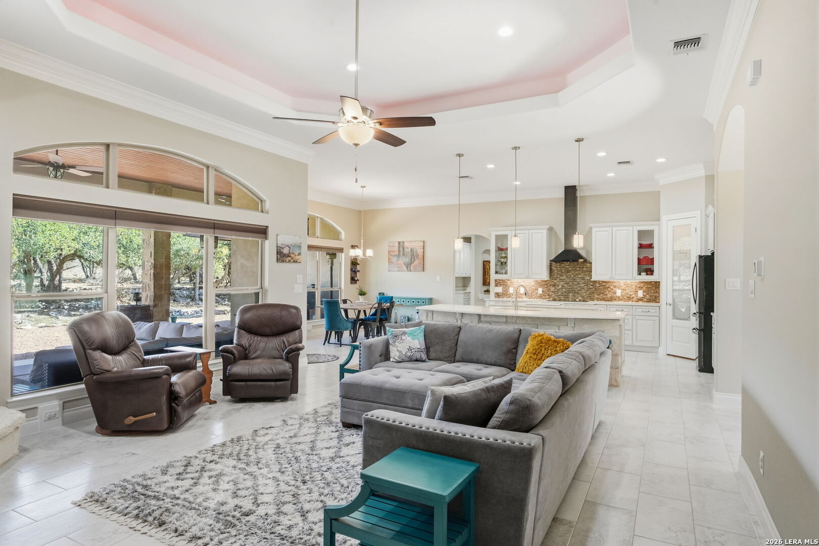 457 Havasu Point Spring Branch, TX 78070 - Photo 8 of 55 a living room with furniture kitchen view and a large window