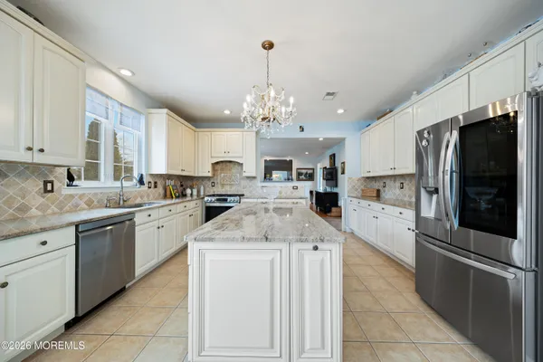 a utility room with closet dryer and washer