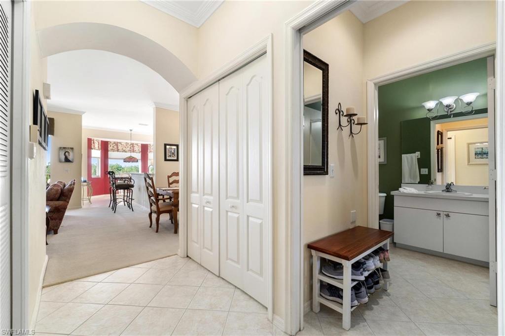 8610 Cedar Hammock Circle, Unit 1242 Naples, FL 34112 - Photo 17 of 50 a view of living room and window