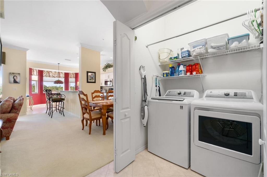 8610 Cedar Hammock Circle, Unit 1242 Naples, FL 34112 - Photo 18 of 50 a view of livingroom with furniture and fireplace