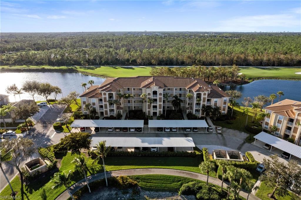 8610 Cedar Hammock Circle, Unit 1242 Naples, FL 34112 - Photo 2 of 50 an aerial view of a house with a garden