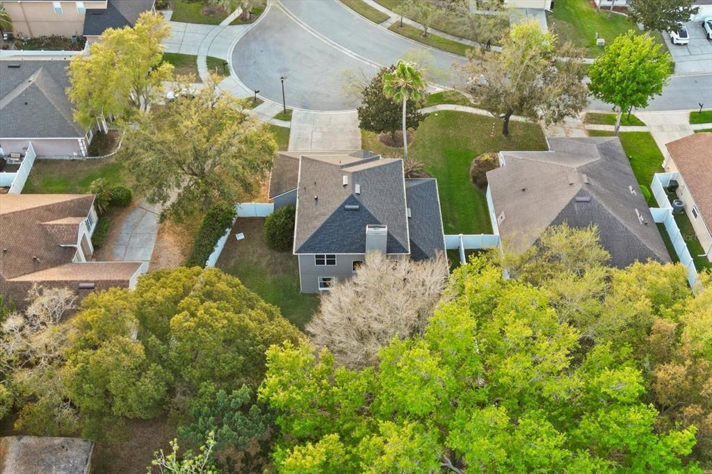 248 Longhirst Loop Ocoee, FL 34761 - Photo 30 of 30 an aerial view of a house with a yard and garden