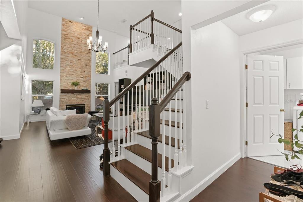 248 Longhirst Loop Ocoee, FL 34761 - Photo 4 of 30 a view of entryway and hall with wooden floor