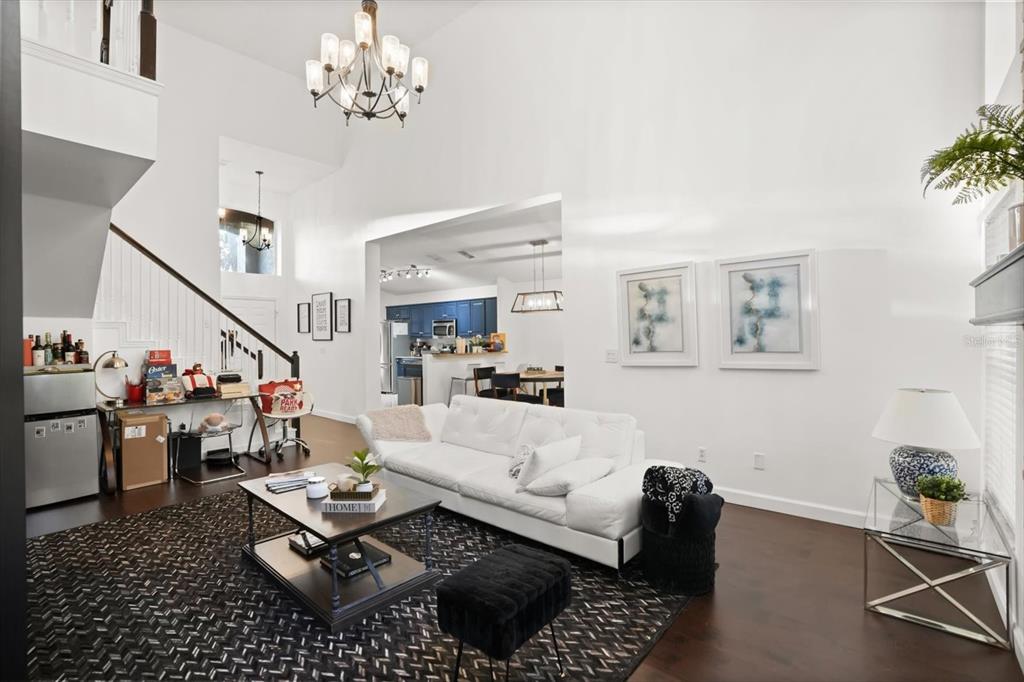 248 Longhirst Loop Ocoee, FL 34761 - Photo 6 of 30 a living room with furniture and wooden floor