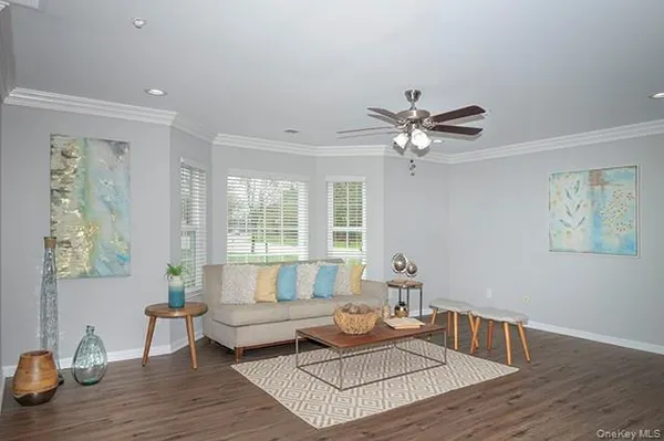 a living room with furniture and window