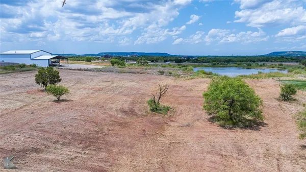 a view of a lake with beach and ocean view