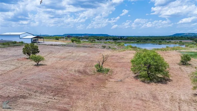 a view of a lake with beach and ocean view