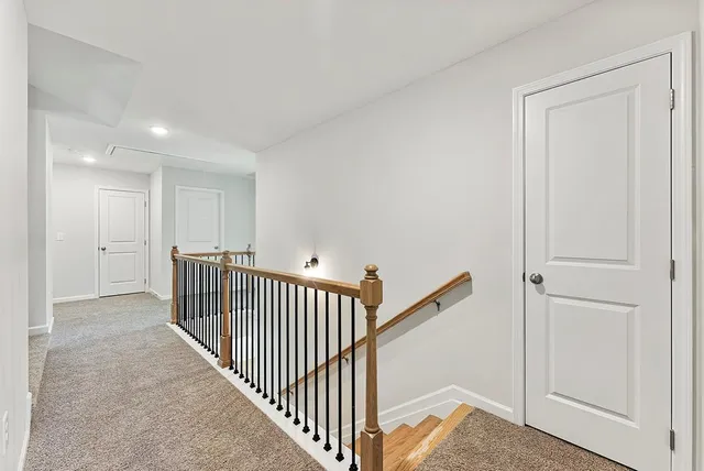 a view of a hallway with a room