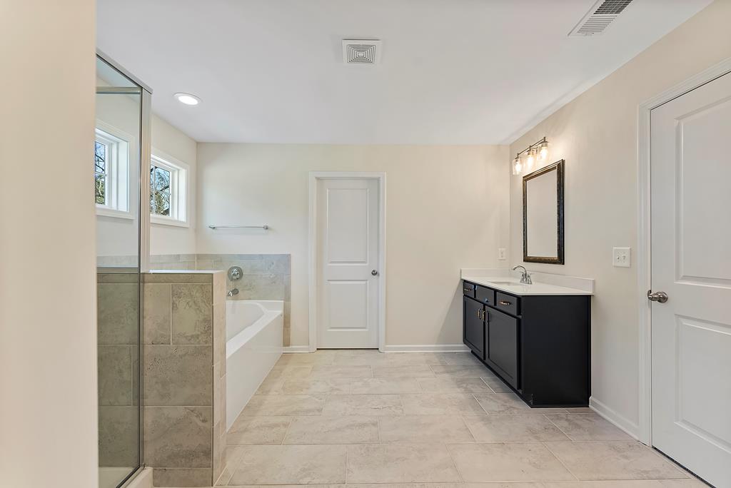 515 Bohannon Road Grantville, GA 30220 - Photo 29 of 40 a view of a kitchen cabinets and refrigerator