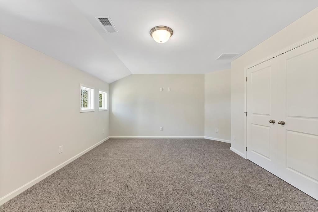 515 Bohannon Road Grantville, GA 30220 - Photo 32 of 40 a view of an empty room with a window