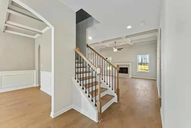 a view of a hallway with stairs