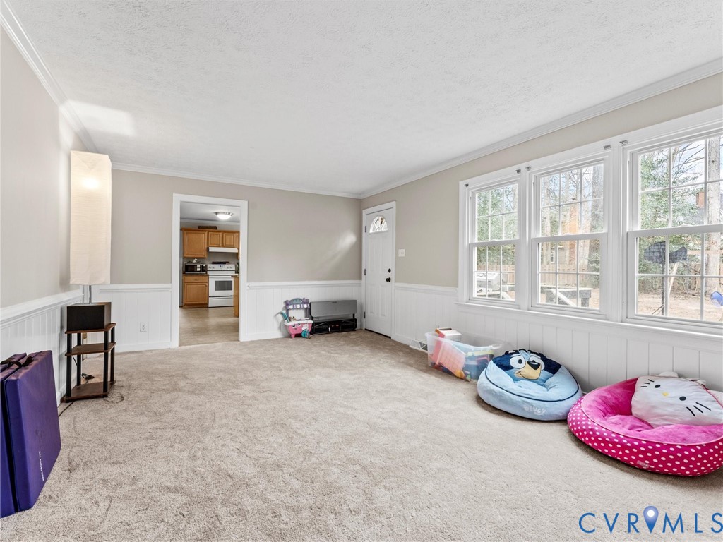 5813 Bent Creek Road Midlothian, VA 23112 - Photo 12 of 50 a view of a livingroom with furniture and a window