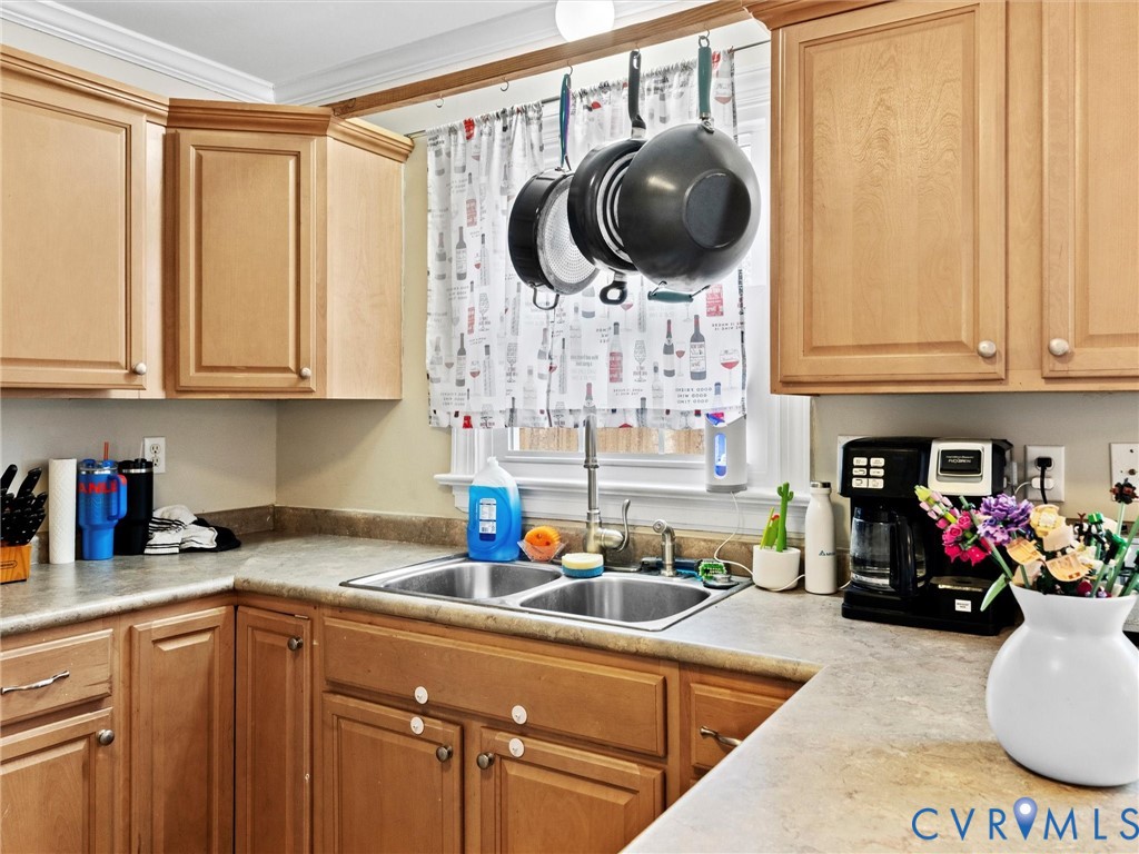 5813 Bent Creek Road Midlothian, VA 23112 - Photo 21 of 50 a kitchen with a stove a sink and cabinets