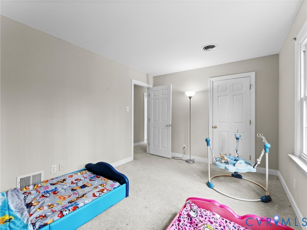 5813 Bent Creek Road Midlothian, VA 23112 - Photo 43 of 50 a bedroom with bed and furniture