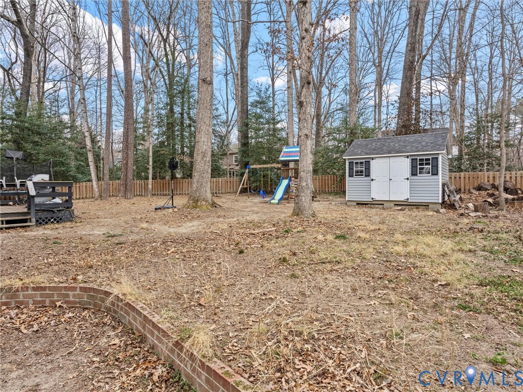 5813 Bent Creek Road Midlothian, VA 23112 - Photo 46 of 50 a view of backyard with trees