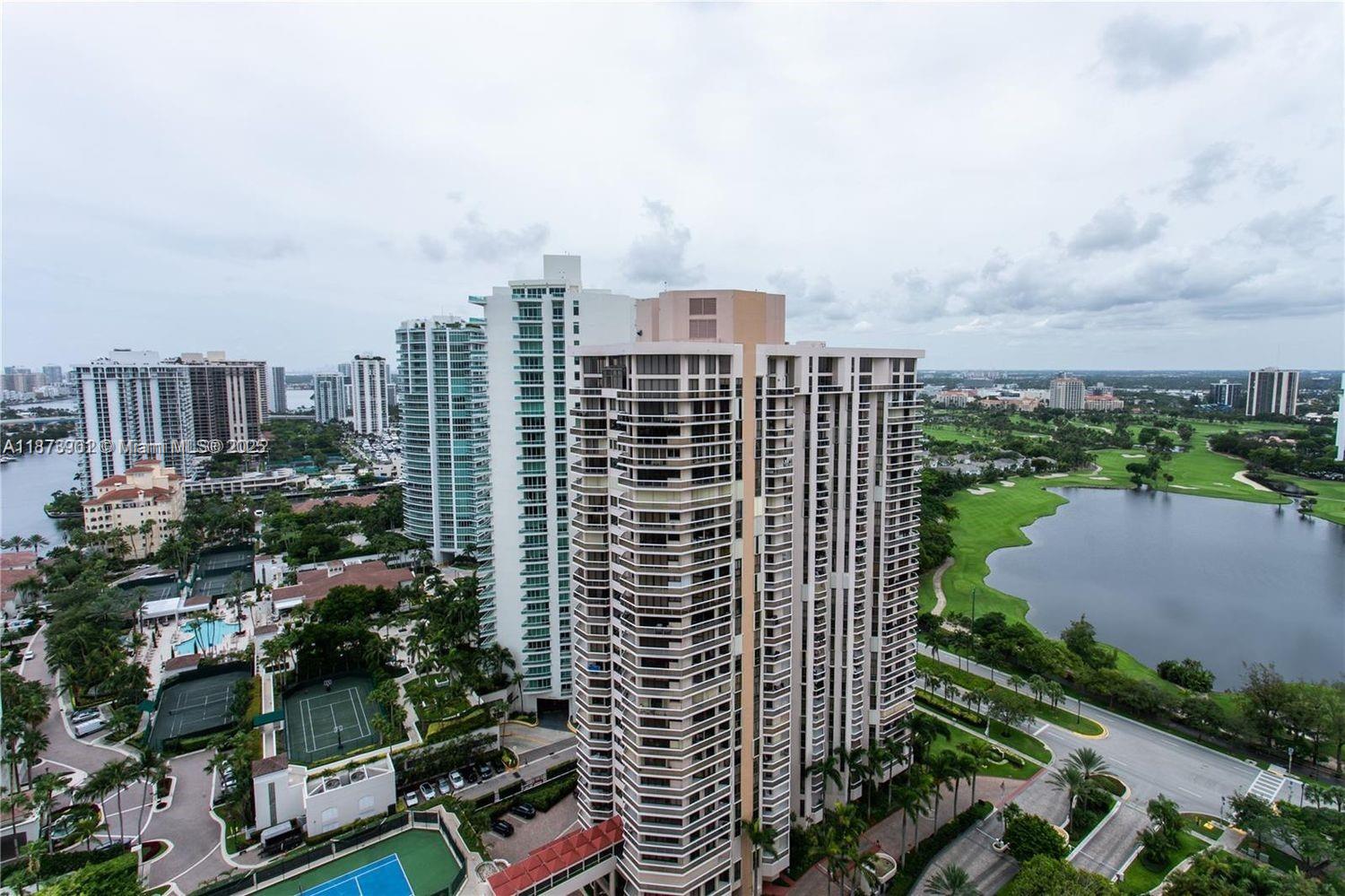 20191 East Country Club Drive, Unit 1903 Aventura, FL 33180 - Photo 18 of 19 a city view with tall buildings