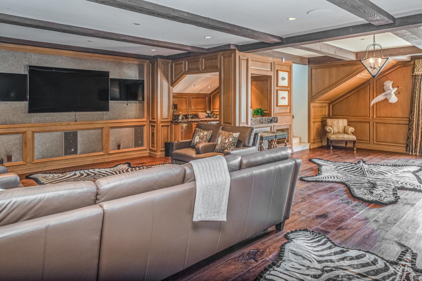 6 Vista Cielo Carmel, CA 93923 - Photo 38 of 50 a living room with couches and a flat screen tv