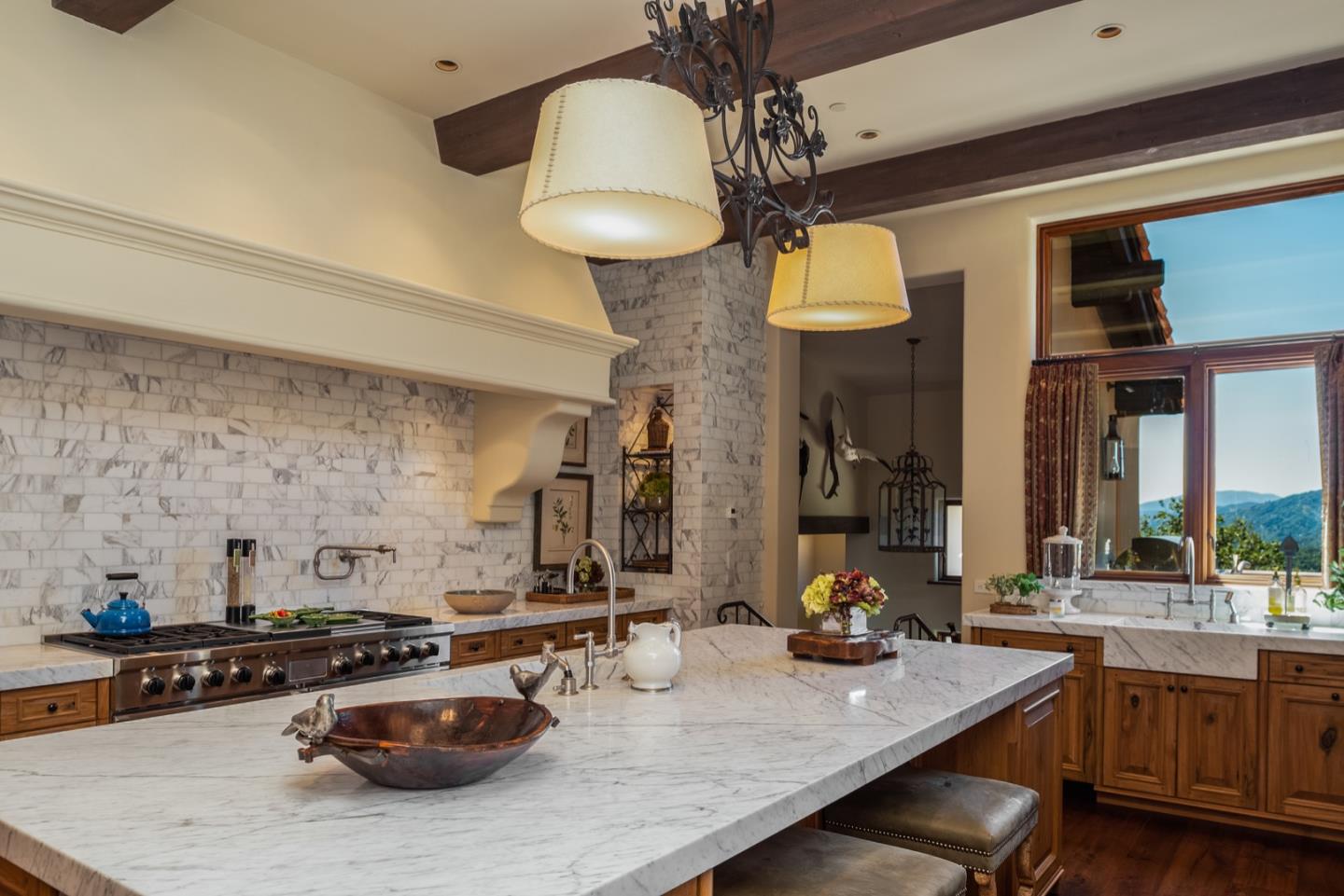 6 Vista Cielo Carmel, CA 93923 - Photo 7 of 50 a kitchen with a table and chairs in it