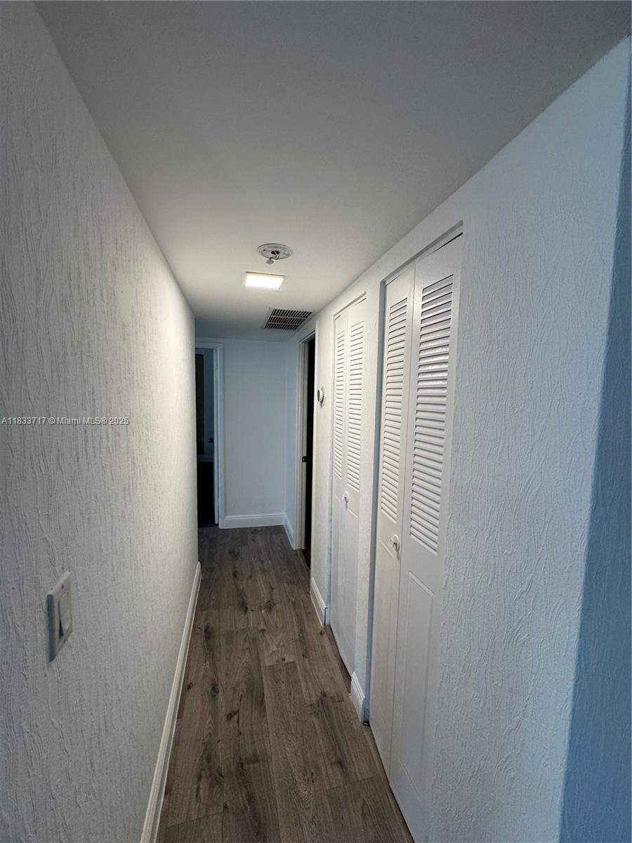 Buckley Towers Miami, FL 33179 - Photo 16 of 18 a view of a hallway