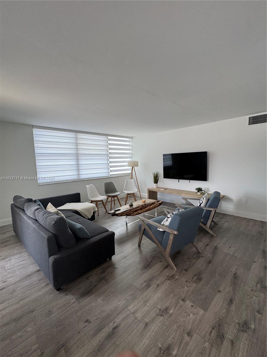Buckley Towers Miami, FL 33179 - Photo 7 of 18 a living room with furniture window and a table