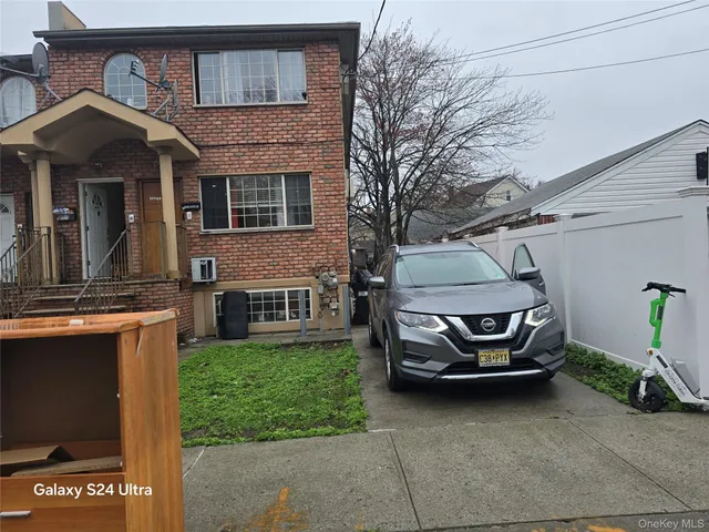 a car parked in front of a house