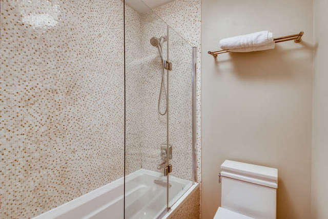 6147 North Sheridan Road, Unit 16A Chicago, IL 60660 - Photo 19 of 30 a bathroom with a shower