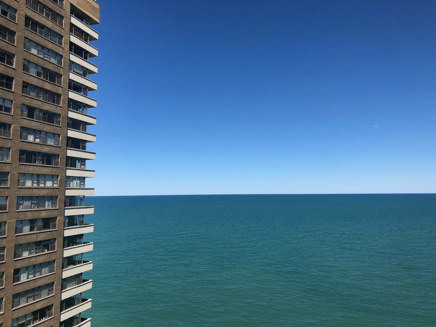 6147 North Sheridan Road, Unit 16A Chicago, IL 60660 - Photo 25 of 30 a view of a city with tall buildings