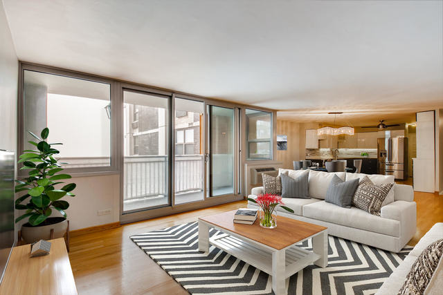 6147 North Sheridan Road, Unit 16A Chicago, IL 60660 - Photo 7 of 30 a living room with furniture and a potted plant