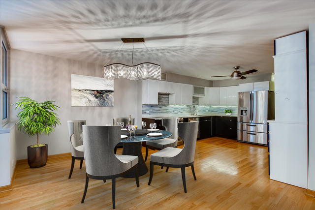 6147 North Sheridan Road, Unit 16A Chicago, IL 60660 - Photo 8 of 30 a view of a dining room with furniture and wooden floor