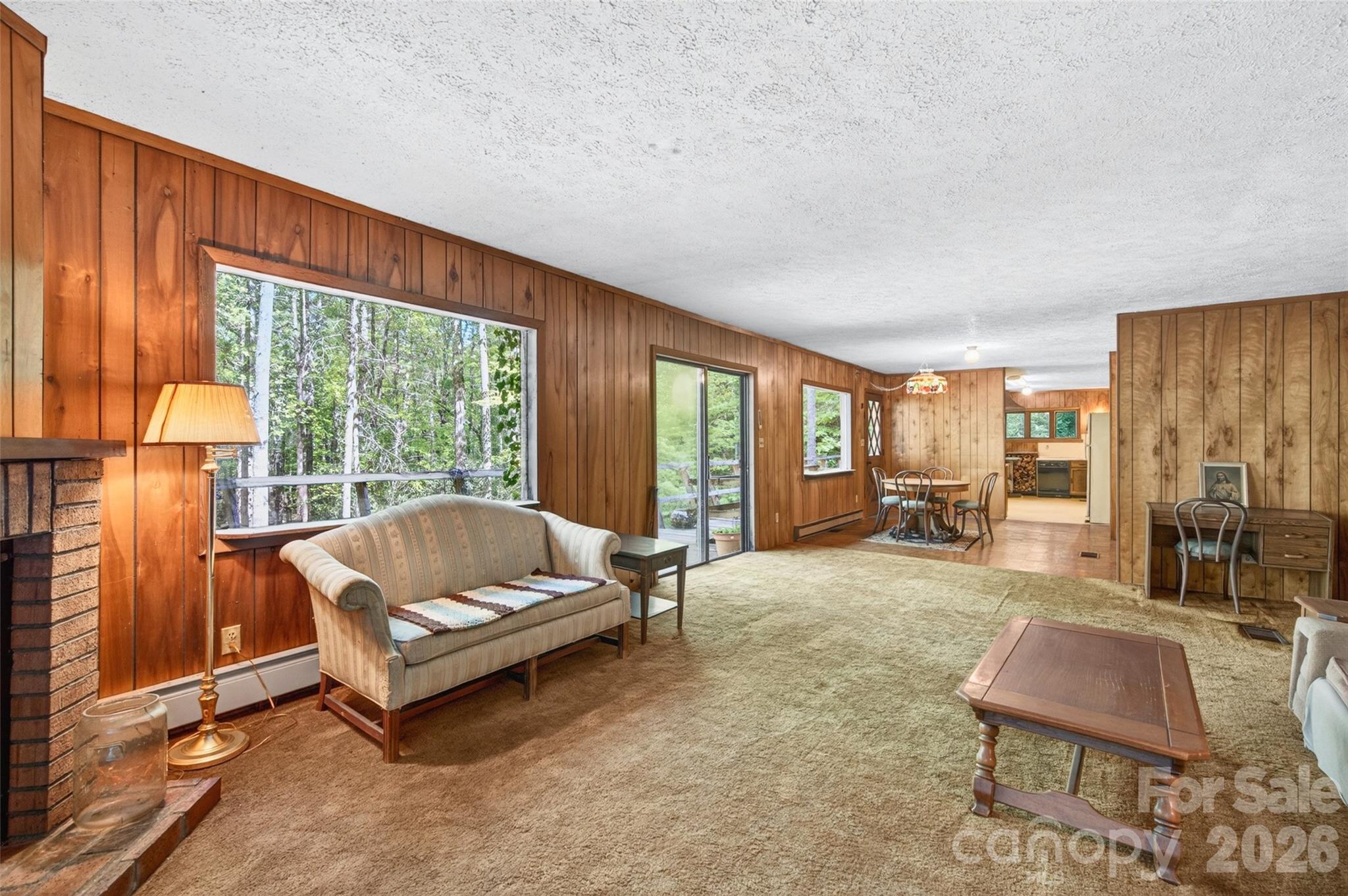 451 Signal Tree Road Deep Gap, NC 28618 - Photo 18 of 26 a living room with furniture and a large window
