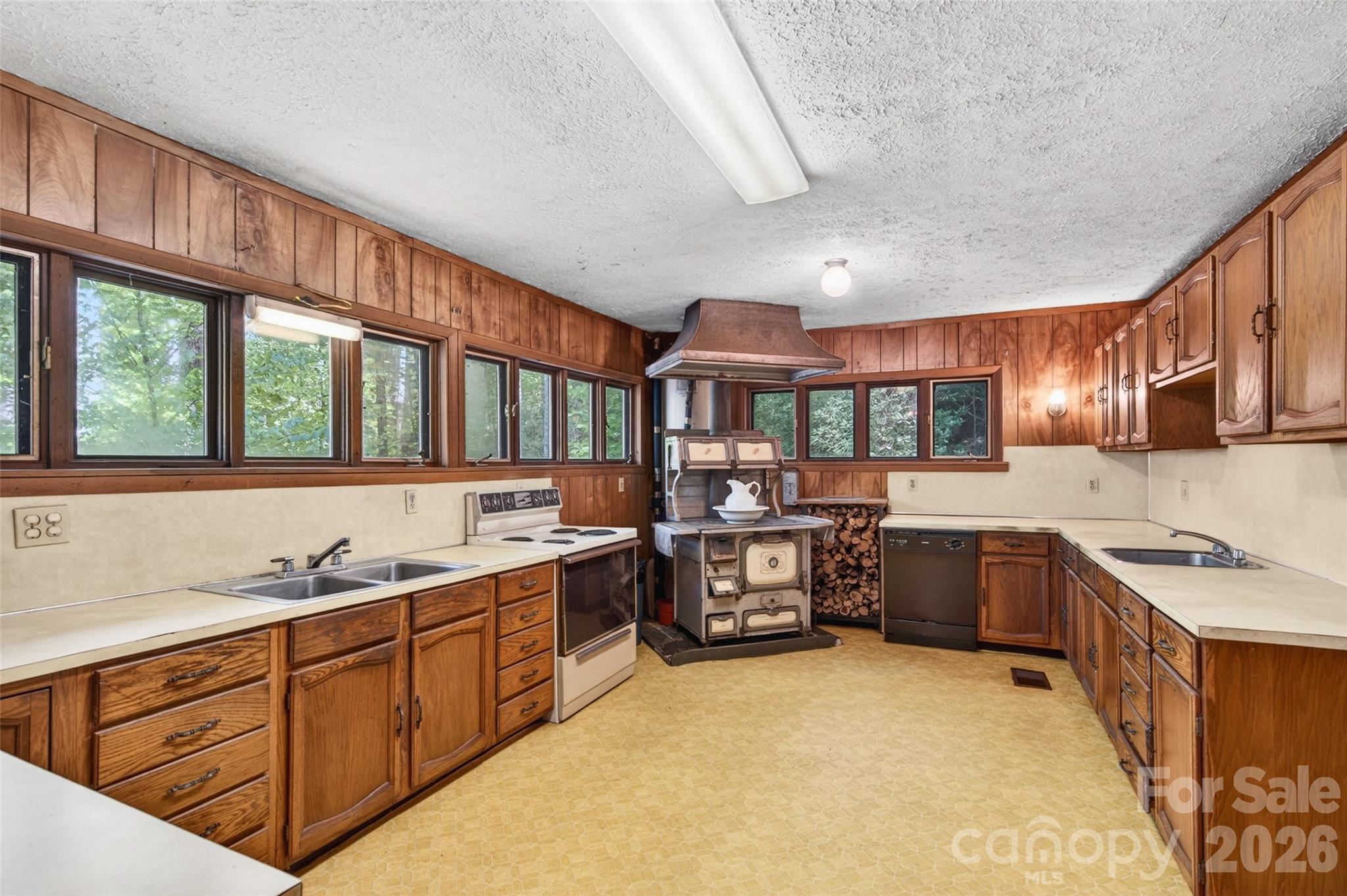 451 Signal Tree Road Deep Gap, NC 28618 - Photo 20 of 26 a kitchen with lots of counter top space