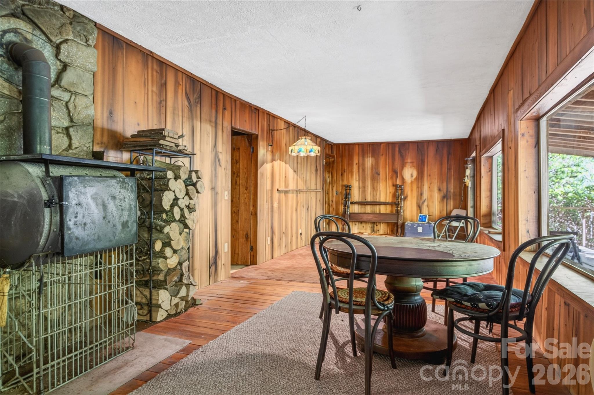451 Signal Tree Road Deep Gap, NC 28618 - Photo 8 of 26 a view of a dining room with furniture and window