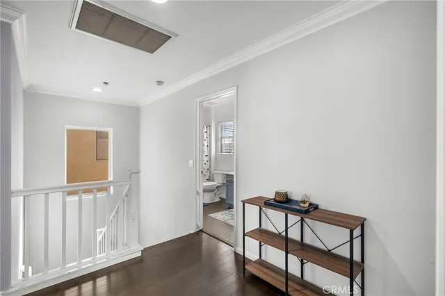 a view of room with window and wooden floor