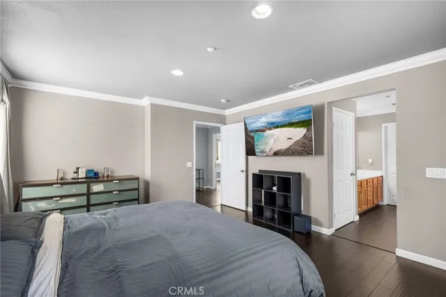 a bedroom with furniture and a fireplace