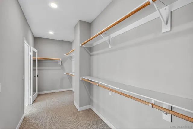 a view of an empty walk in closet