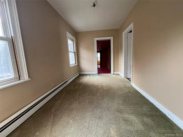 a kitchen with stainless steel appliances granite countertop a refrigerator a stove and a sink