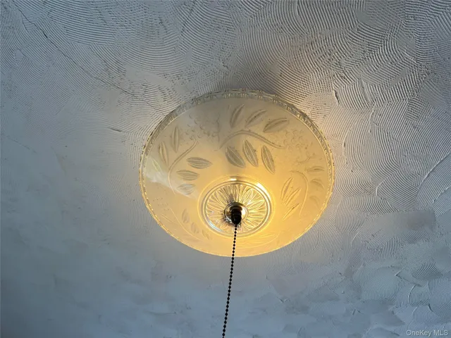 a bathroom with a sink and vanity