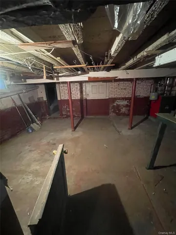 a view of barbeque area with sitting area