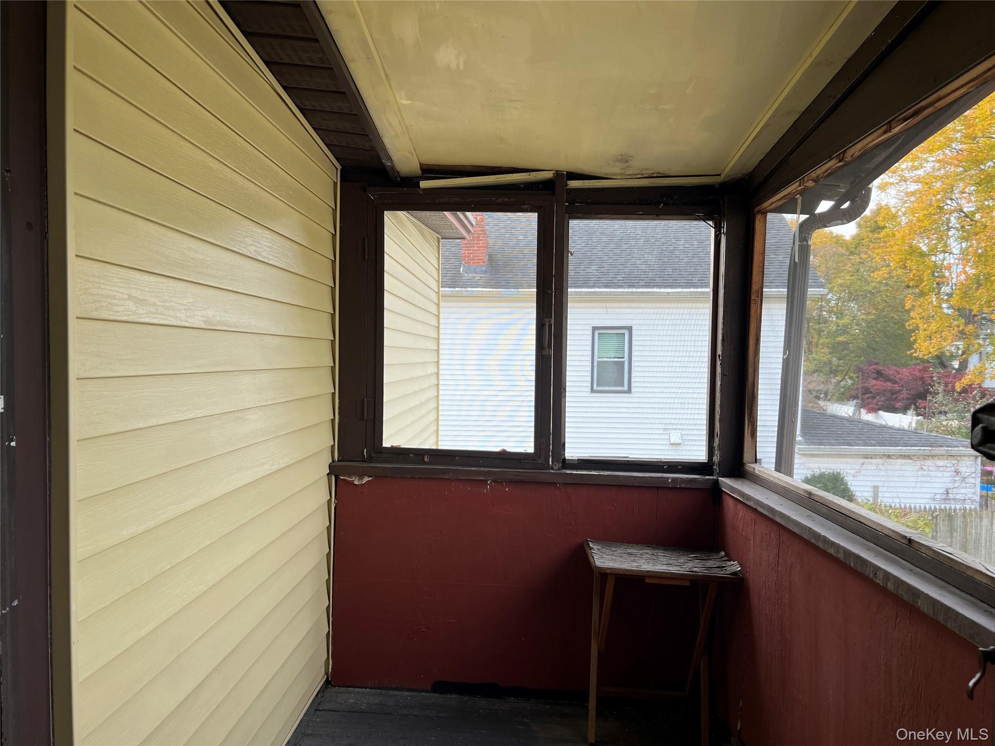 19 Grove Street Beacon, NY 12508 - Photo 7 of 38 View of unfurnished sunroom