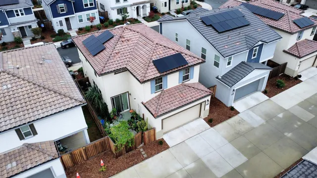 an aerial view of a house with garden