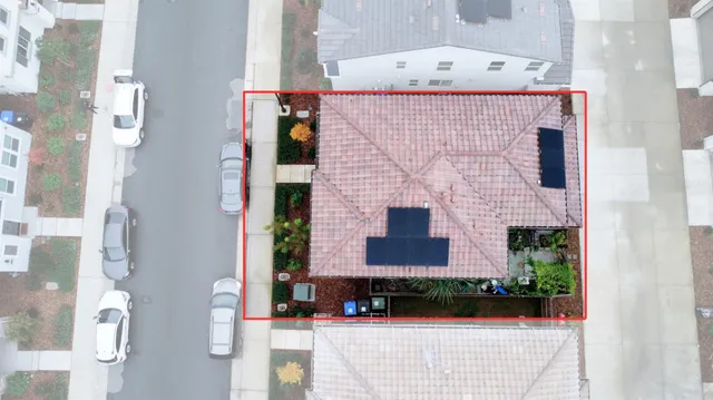 a brick building with a small yard