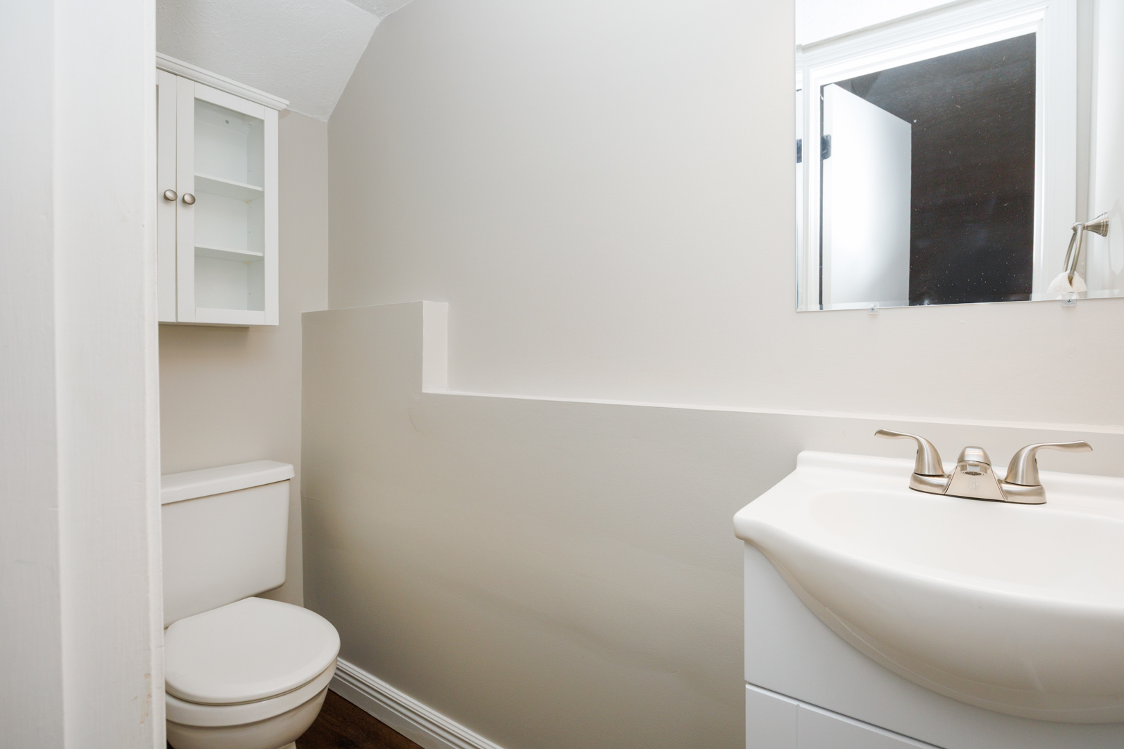 107 North Orr Drive, Unit F Normal, IL 61761 - Photo 15 of 30 a bathroom with a toilet a sink and mirror
