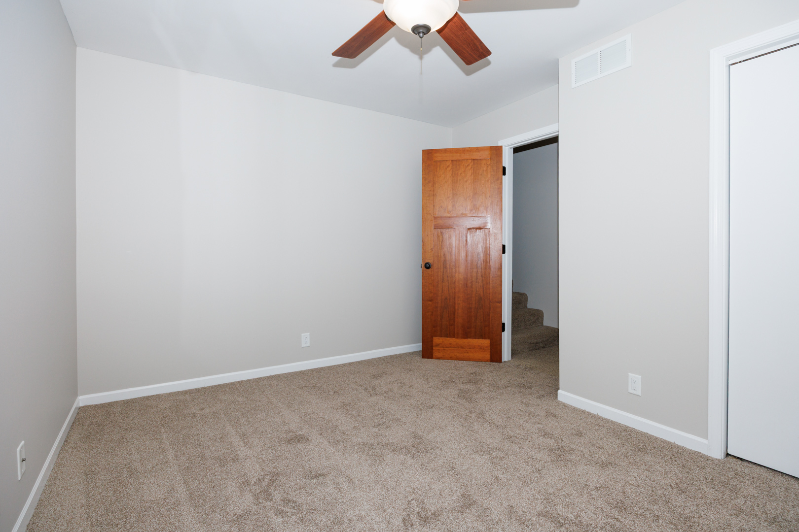107 North Orr Drive, Unit F Normal, IL 61761 - Photo 20 of 30 an empty room with closet area
