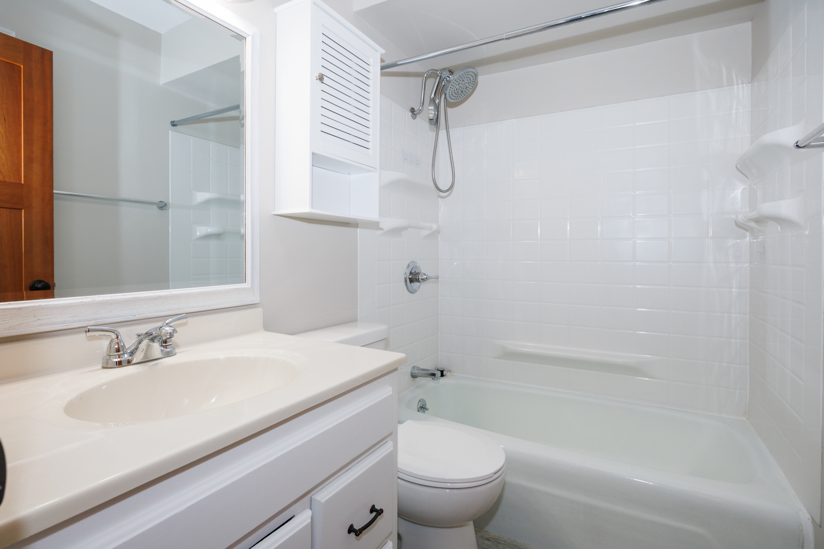 107 North Orr Drive, Unit F Normal, IL 61761 - Photo 21 of 30 a bathroom with a sink a toilet and shower