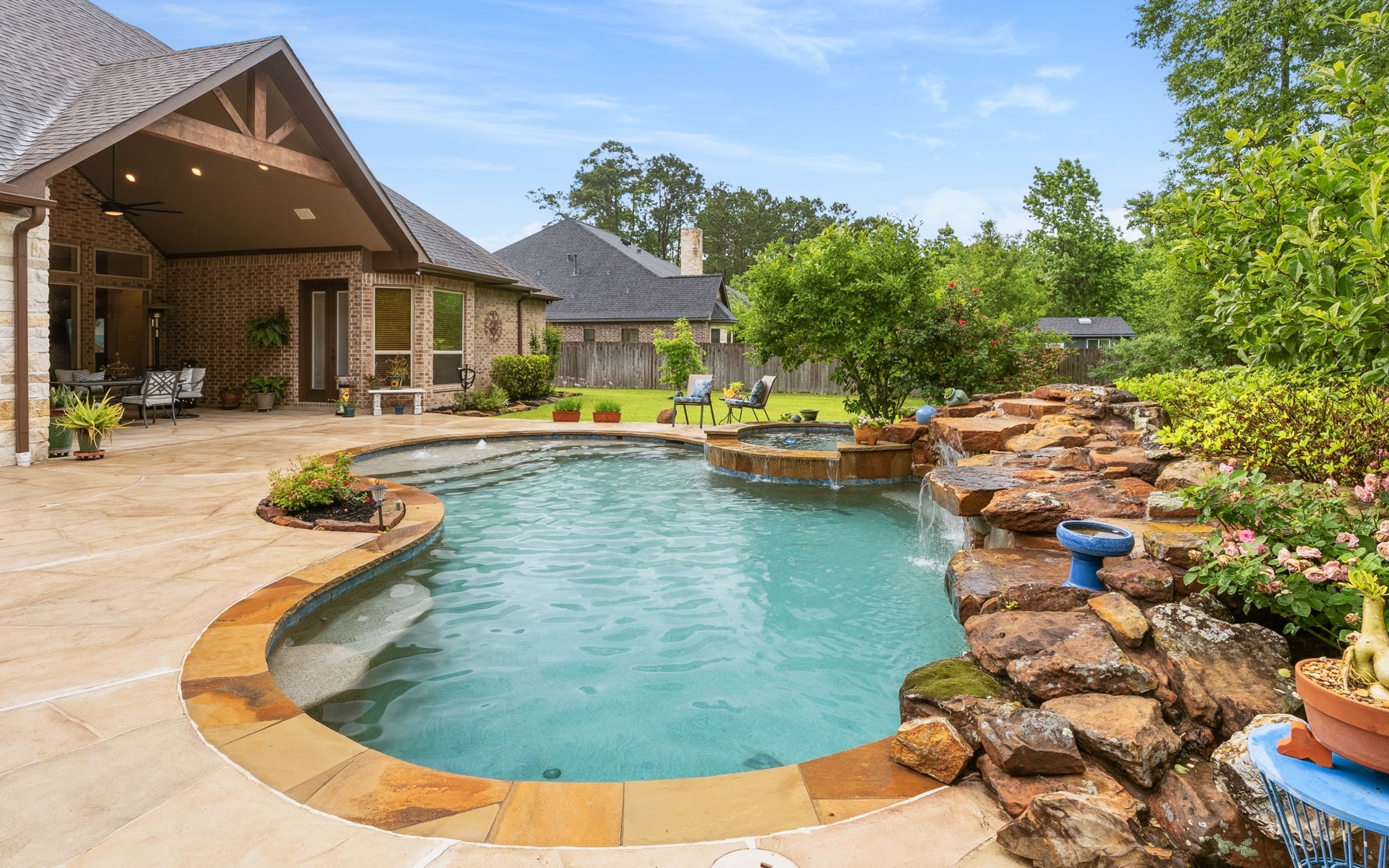 28502 Crawford Ridge Court Huffman, TX 77336 - Photo 40 of 50 swimming pool view with a lake view