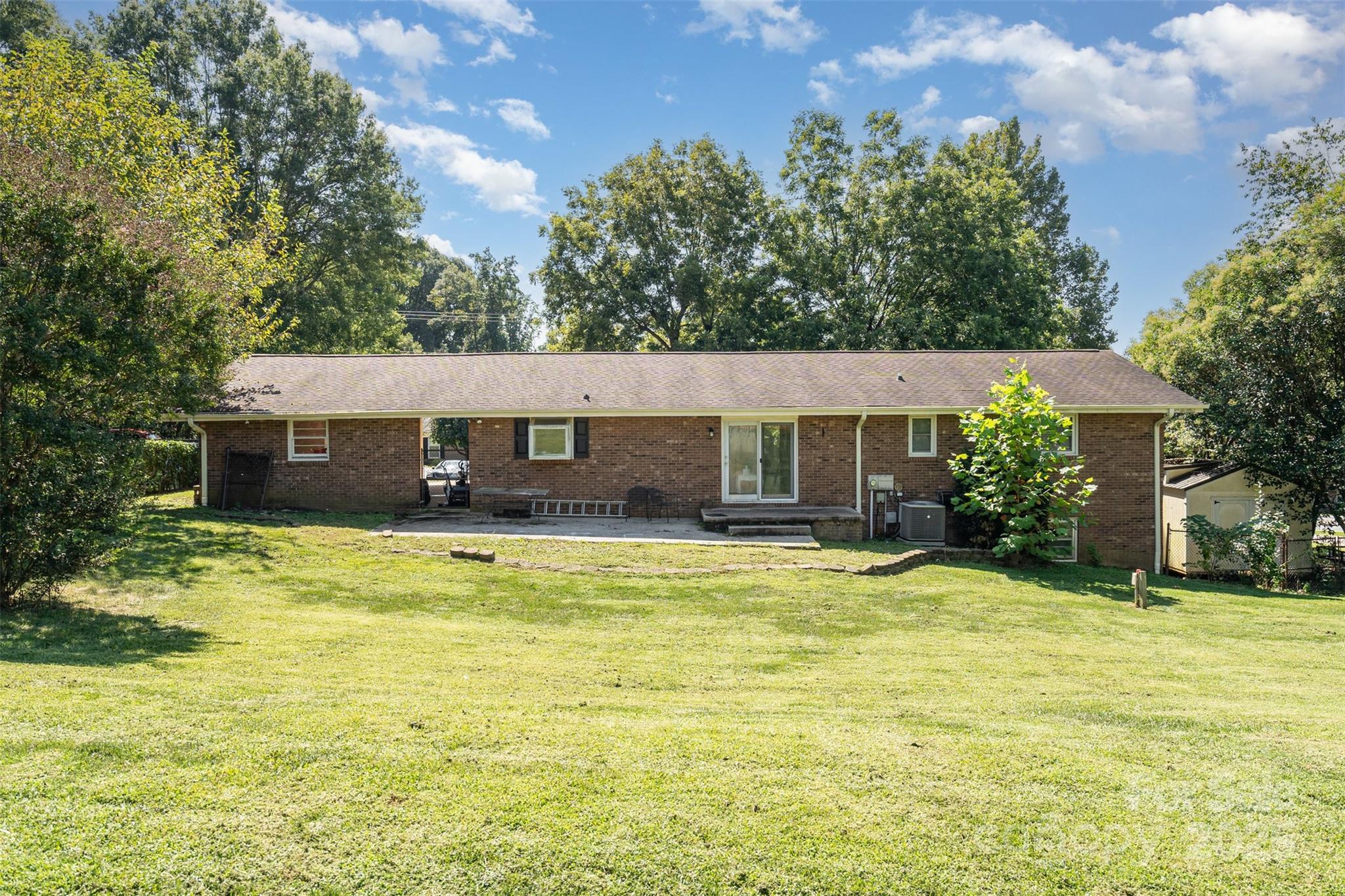 5609 Grace Chapel Road Hickory, NC 28601 - Photo 26 of 29 a view of a house with a swimming pool
