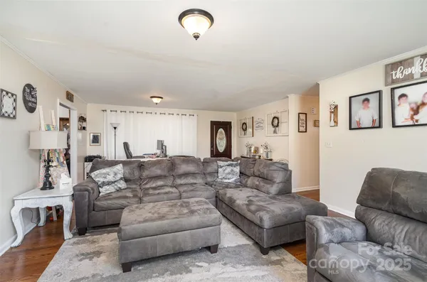 a living room with furniture and a couch