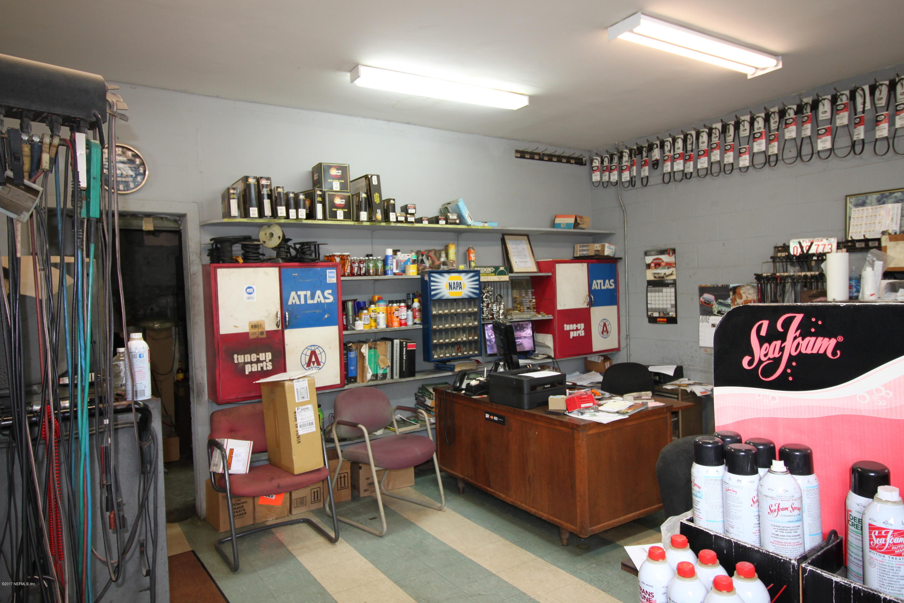 2449 Kings Road Jacksonville, FL 32209 - Photo 13 of 17 a living room with lots of furniture and toys