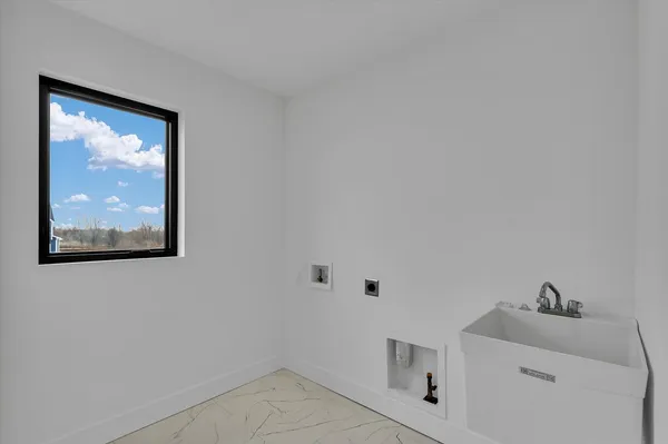 a bathroom with a toilet and a sink